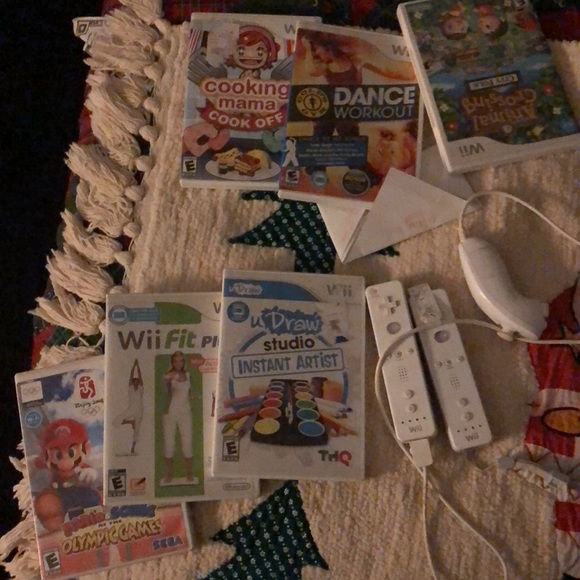 Wii with games Guitar and steering wheel three controllers - Picture 4 of 4